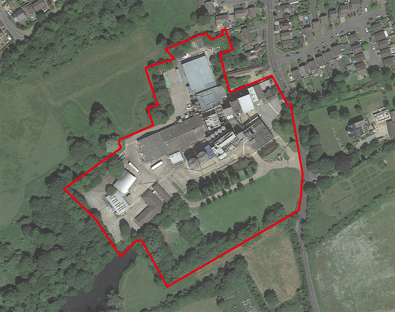 The site is a brownfield area of a now unoccupied and derelict mill factory